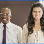 Young African American male and Caucasian female executives.